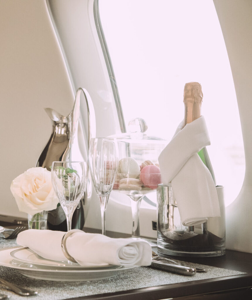 private jet interior Champagne luxury travel first class