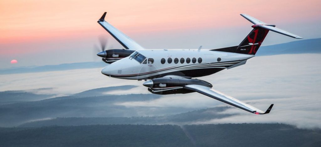 Beechcraft King Air 350 in front of sunset