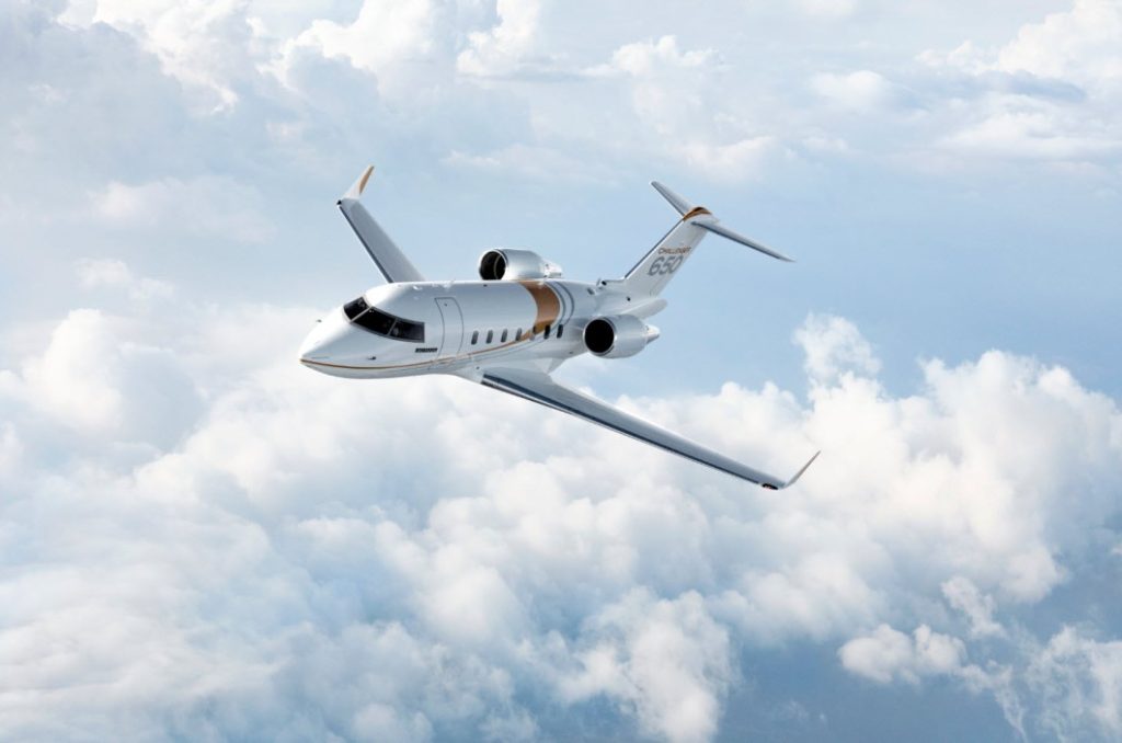 Bombardier Challenger 650 flying in clouds